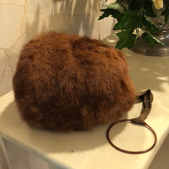 Vintage 1950s genuine mink hand muff with wristlet